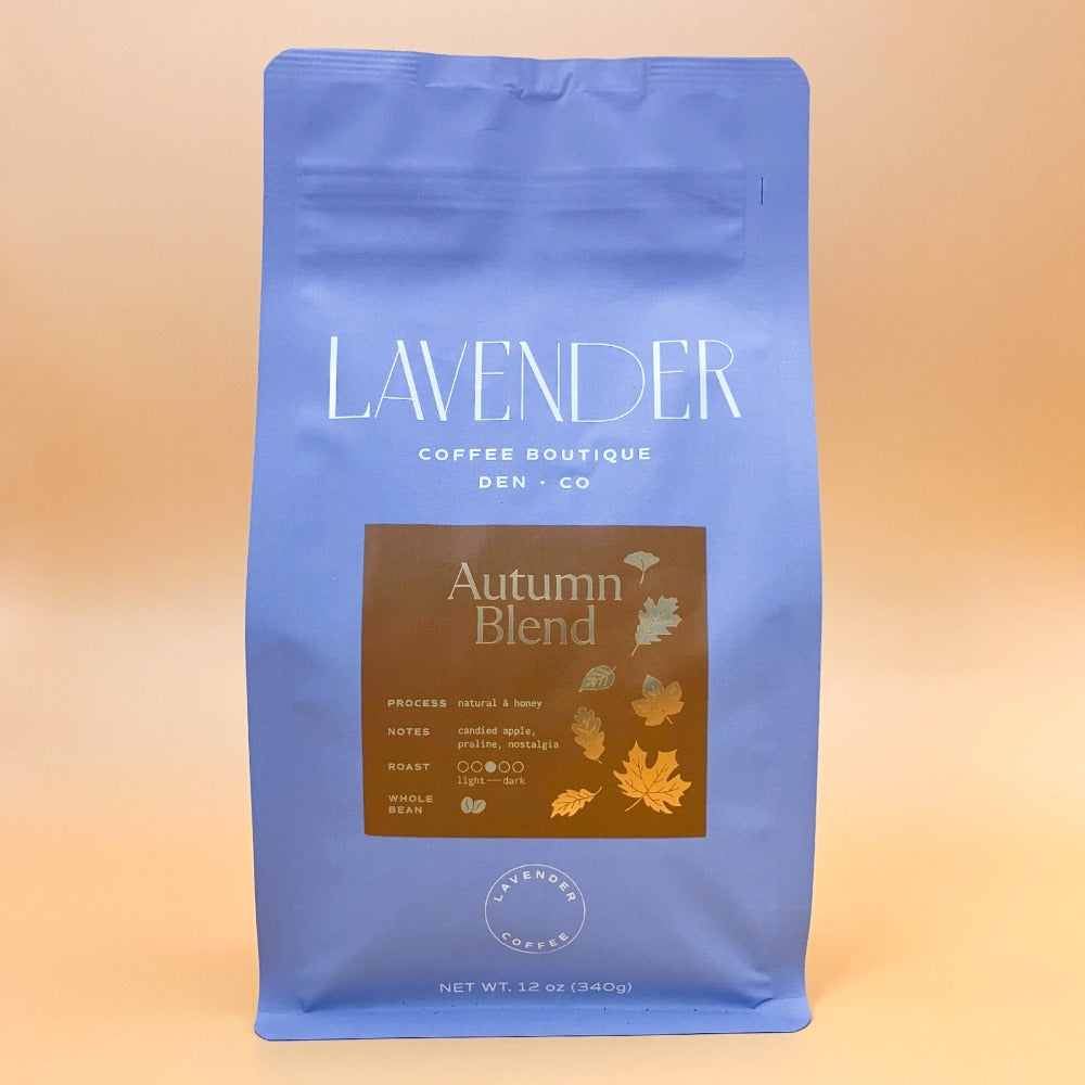 Mold-free small batch coffee beans Autumn Blend bag showing label and beans on table